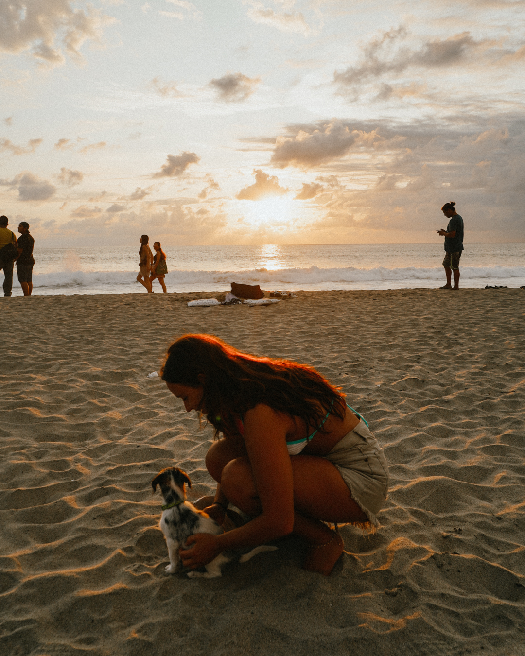 La Punta sunset with dog and girl