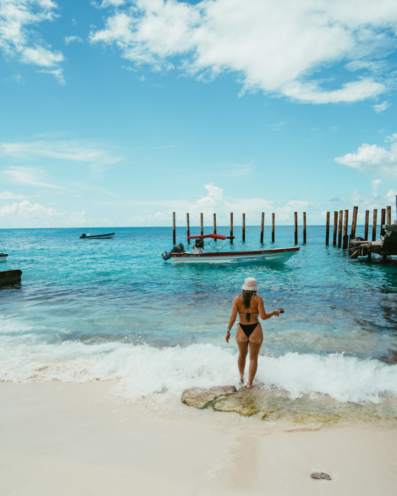 Solo travel girl at San Andres blue beach