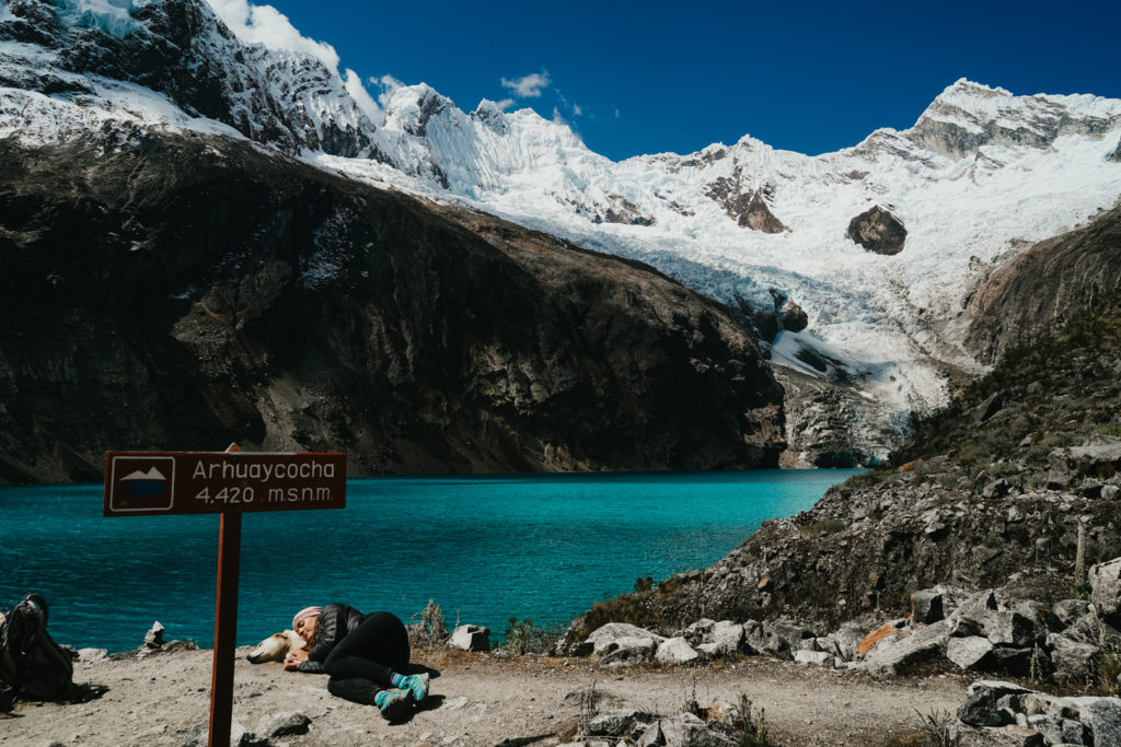 Woman resting during the Santa Cruz trek in Huaraz Peru at laguna